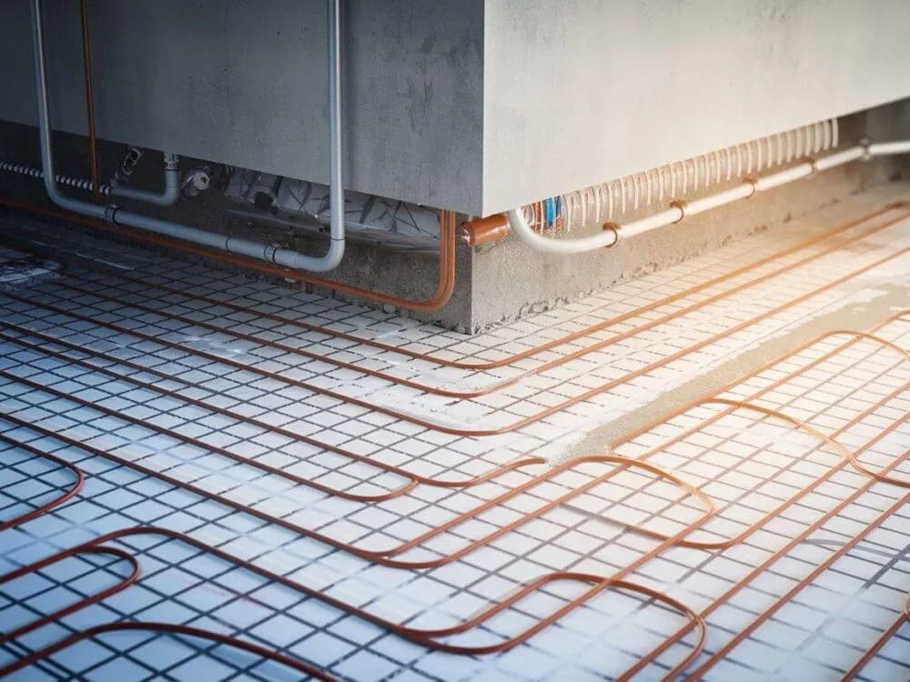 Optymalna grubość wylewki pod ogrzewanie podłogowe – uniknij błędów i oszczędź ciepło